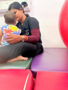 Our therapist providing one-to-one attention to a child in Hyderabad.